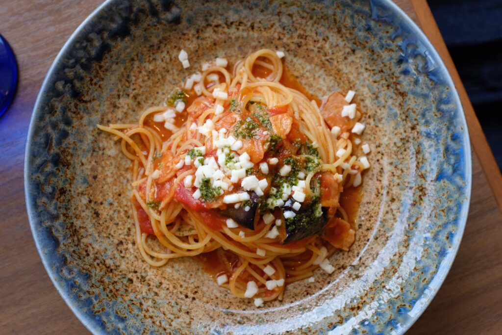 Tomato sauce with zucchini over pasta